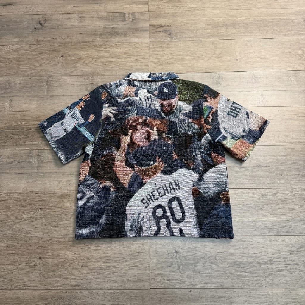 CHAMPIONS 2025 V2 TAPESTRY TEE